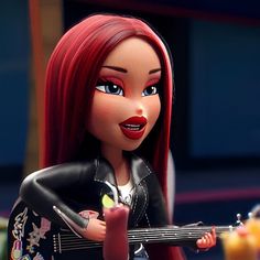 a doll with red hair holding a guitar and pointing to the side while wearing a black leather jacket