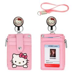 a pink hello kitty card holder with a lanyard and key chain attached to it