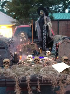 a truck is decorated with skulls and other decorations