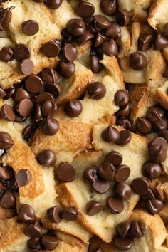 chocolate chips and croissants are spread out on top of the pizza crust