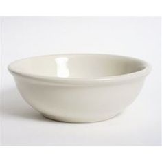 a white bowl sitting on top of a table