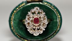 ANTIQUE VICTORIAN 18K GOLD TOP SILVER NATURAL ROSE CUT DIAMOND AND RUBY RING In very good condition. Total weight is 4.8 grams. Totally about 0.08 ct diamond. The diamond has s1-s2 clarity and I-J-K color. Totally 0.30 ct Ruby. Ring size is US 7. We can make any size.(We offer free resizing). Original victorian about 100 years old. Please contact for any questions. Antique Yellow Gold Filigree Ring With 17 Jewels, Victorian Ruby Ring In Yellow Gold With Intricate Design, Victorian Yellow Gold Ruby Ring With Intricate Design, Victorian Ruby Ring With Diamond, Elegant Oval Ruby Ring With Intaglio, Heirloom Yellow Gold Ruby Ring With Filigree, Antique Yellow Gold Ruby Ring With Filigree, Vintage Gold Ruby Ring With Filigree, Ornate Yellow Gold Ruby Ring For Anniversary