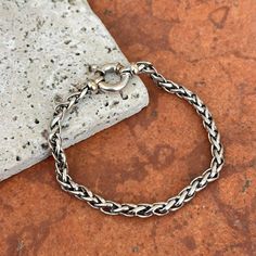 "Estate 18KT White Gold Wheat Link Style Links Bracelet 8\" Length Shown on a 6\" wrist White Gold Toggle Clasp Approx 4.5mm Width 3-D Links; This is not a flat bracelet Weighs 11.20 Grams     Stamped 750 Designer appeal! Estate Piece, No Flaws Lovely toggle clasp- hang a charm off of! Lightweight, but substantial in presence. Wear alone or with other bracelets! Please check out our other jewelry items. Let us know if you have any questions. Thank you, Legacy Saint Jewelry FOLLOW US ON INSTAGRAM: @legacysaintjewelry -OUR RETURN POLICY-  To return an item you must first contact us within 7 days of receiving your item(s). Upon messaging us we will provide the steps in returning or exchanging. The buyer is fully responsible for paying for return shipping. We offer refunds minus $10 or 10% of Classic Adjustable Bracelet With Lobster Clasp, Classic Sterling Silver Bracelet With Toggle Clasp, Classic Bracelet With Toggle Clasp And Oval Link, Elegant Sterling Silver Bracelet With Toggle Clasp, Elegant Sterling Silver Bracelet With Toggle Clasp For Everyday, Classic Metal Bracelets With Sterling Silver Clasp, Classic Chain Bracelet With Lobster Clasp, Classic Adjustable Braided Bracelet With Lobster Clasp, Classic Everyday Bracelets With Toggle Clasp