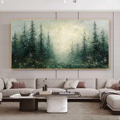 a living room filled with furniture and a large painting on the wall above it's couches