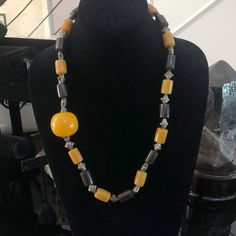 "oºOºooºOOºooºOOºooºOOºo For those who love vintage amber jewelry but can't afford the prices. These acrylic beads will fool anyone especially the large bauble. So enjoy! This necklace measures 24-1/2\" long. Each barrel bead is 12x16mm and strung with Tibetan-style silver spacers. The large focal bead measures almost 30mm! Metal is silver plated. Beads are acrylic/lucite/celluloid/plastic. Unsigned. Metal has some mild patina. Other than that it is in excellent pre-worn condition. ❤️'¨) ¸.*'¸.* Luxury Amber Oval Beaded Necklace, Amber Bead Necklace, Princess Necklace, Amber Beads, Amber Jewelry, Design Silver, Focal Bead, Vintage Rhinestone, Acrylic Beads