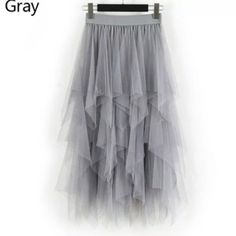 Silver Skirt For Spring, Silver Spring Skirt, Gray Party Skirt, Gray Tiered Skirt For Summer, Gray Tiered Skirt For Spring, Summer Tiered Gray Skirt, Gray Tiered Summer Skirt, Spring Gray Tiered Skirt, Gray Spring Party Bottoms