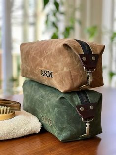 "Our rugged Dopp kits are the perfect, luxurious yet durable gift for the man in your life. Handmade in the USA, It's a gift that will stand the test of time and is an essential part of anyone's traveling. Straight from our workshop to your door, our Dopp kits can take a beating and still look amazing. Made from the finest waterproof waxed canvas and genuine leather, you know you're getting the best when you invest in one of our bags. It's a gift that can take whatever the bath, weather, travel Dopp Kit, Groomsmen Gift, Kit Bag, Monogrammed Items, Waxed Canvas, Water Resistant Fabric, Large Bag, Groomsman Gifts, Lining Fabric