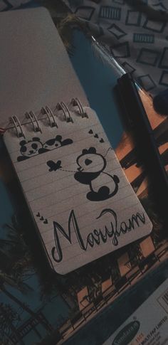 a notebook with the word mama written on it