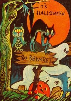 an image of halloween scene with cats and ghostes on the street sign that says it's halloween so beware