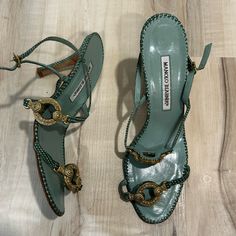 Manolo Blahnik Green Snakeskin Strappy Sandals Size 39.5 With Gold Hardware Very Good Pre-Owned Condition With Normal Signs Of Light Use. See Photos All Questions Are Welcomed If Any Luxury Green Heels With Buckle Closure, Green Formal Sandals With Single Toe Strap, Designer Green Formal Sandals, Formal Green Sandals With Buckle Closure, Green Formal Sandals With Buckle Closure, Designer Green Sandals With Single Toe Strap, Fitted Green Leather Sandals, Manolo Blahnik Green, Shoes Manolo Blahnik