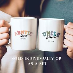 two people holding coffee mugs with the words uncle and uncle on them in different colors