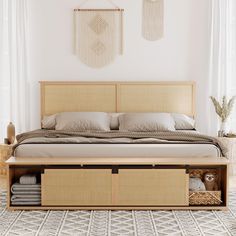 a bed with two storage drawers underneath it in a room that has white walls and flooring