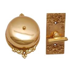 an image of a golden door handle and knob