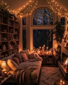 a living room filled with furniture and lots of lights on the windows sills