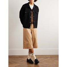 Acne Studios' cotton-blend twill overshirt is cut for a slightly loose fit, so it layers easily over a tee or sweater. The flap pockets at the chest nod to classic trucker styles.