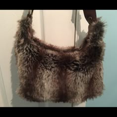 Selling this Faux fur handbag in my Poshmark closet! My username is: jaclynleigh. #shopmycloset #poshmark #fashion #shopping #style #forsale #Sonoma #Handbags Brown Faux Fur Lined Shoulder Bag For Shopping, Brown Shoulder Bag With Faux Fur Lining For Shopping, Brown Shoulder Bag With Faux Fur Lining For Fall, Fall Brown Shoulder Bag With Faux Fur Lining, Brown Faux Fur Lined Shoulder Bag For Winter, Brown Faux Fur Rectangular Shoulder Bag, Brown Shoulder Bag With Faux Fur Lining For Winter, Brown Winter Shoulder Bag With Faux Fur Lining, Winter Brown Faux Fur Shoulder Bag