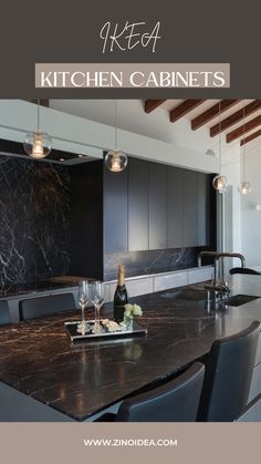 an image of a kitchen with marble countertops and cabinets in it, the title reads keera kitchen cabinets