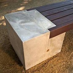 a bench made out of concrete and wood