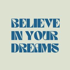 the words believe in your dreams on a gray background with blue letters that read, believe in