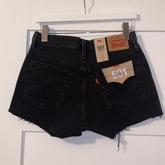 Levi’s 501 Original Denim Shorts (Black Washed) 5 Pockets Button Fly Distressed 100% Cotton High Waist New With Tags New To Poshmark? Get $10 To Spend By Using My Code At Sign Up! Tamaree_michele Denim Shorts Black, At Sign, Clueless Outfits, Stretch Denim Shorts, White Jean Shorts, Festival Shorts, Levi’s Jeans, Denim Cutoff Shorts, Denim Cutoffs