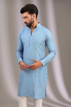 Blue kurta with zari thread embroidered lotus patterns. Comes with pant. - Aza Fashions Blue Kurta For Puja With Traditional Drape, Blue Kurta For Puja And Festivals, Blue Kurta For Puja In Transitional Season, Blue Kurta For Puja And Transitional Season, Blue Kurta For Puja And Eid, Blue Kurta For Puja And Navratri, Blue Traditional Drape Kurta For Puja, Blue Sherwani With Zari Work For Puja, Blue Transitional Kurta For Puja