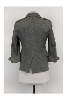 This chic blazer is made with a soft-to-the-touch fabric. It has a classic double breasted front with silver-tone buttons. Style it with skinny jeans and tall boots. Size XS 73% cotton, 23% acrylic, 4% polyester Collared 3/4 sleeves Double breasted front Silver-tone buttons Front pockets Bust 32" Waist 33" Shoulder to hem 22" Trendy Fitted Double-breasted Pea Coat, Fitted Button-up Pea Coat For Winter, Trendy Fitted Double-breasted Blazer, Fitted Double-breasted Pea Coat With Button Cuffs, Trendy Fitted Pea Coat With Double Button Closure, Trendy Winter Double-breasted Blazer, Fitted Winter Blazer With Double Button Closure, Fall Double-breasted Fitted Blazer, Fall Fitted Double-breasted Blazer