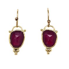 A vibrant pair of rosecut rubies are set in 14k yellow gold with gold accent beads Finished with hand formed solid gold ear wires. Approximate stone size: 10mm x 9mm Approximate stone weight: 5.9cts Mohs Hardness scale: 9 This piece is handmade to order in Emily's Hudson Valley studio. Please allow for slight variations in stone color, size and shape. Please allow 14-21 days to ship unless the piece is in stock. If you have questions about sizing, shipping or custom orders please reach out to us Gold Faceted Ruby Earrings, Mohs Hardness Scale, Hardness Scale, Local Jewelry, Gold Accent, Hudson Valley, 21 Days, Gold Accents, Ear Wires