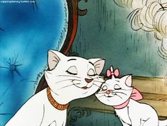 an animated image of two cats kissing each other in front of a blue chair and mirror