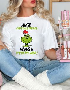 FUNNY GRINCH TSHIRT - Feeling Extra Grinchy Today Christmas Shirt Celebrate the season with a touch of Grinchy humor! This unisex tee is perfect for adding a bit of playful attitude to your Christmas festivities. Whether you're lounging at home or heading out for holiday fun, this shirt brings both style and a grin-worthy vibe. Product Highlights: Material: Made from 100% cotton for maximum comfort. Sport Grey consists of 90% cotton and 10% polyester; Ash Grey is 99% cotton and 1% polyester; Heather colors are a blend of 50% cotton and 50% polyester. Fabric Weight: 5.0-5.3 oz/yd² (170-180 g/m²) for a substantial yet breathable feel. Fit: Unisex classic tee cut for a structured look that pairs well with casual and layered streetwear. Construction: Features open-end yarn, tubular fabric, tap Green Holiday Tops With Letter Print, Green Holiday Top For Christmas, Holiday Green Tops With Letter Print, Funny Green Tops As A Gift, Christmas Green Cotton Tops, Green Cotton Christmas Tops, Green Christmas Holiday Top, Green Short Sleeve Christmas Tops, Grinch Themed T Shirts