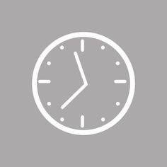 a white clock on a gray background