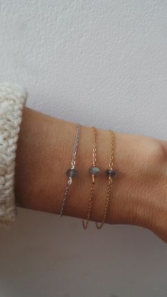 Dainty labradorite bracelet. Blue flash labradorite bracelet. | Etsy Dainty Crystal Bracelet With Adjustable Chain, Delicate Silver Bracelets With Ethical Gemstones, Minimalist Crystal Bracelet Gift, Minimalist Rose Gold Bracelet With Gemstone, Handmade Minimalist Crystal Bracelet, Minimalist Rose Gold Gemstone Bracelet, Dainty Moonstone Bracelets For Everyday, Dainty Labradorite Jewelry For Everyday, Elegant Labradorite Bracelets For Gifts