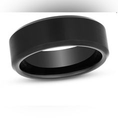 a black ceramic ring with a satin finish