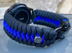 "FREE USPS PRIORITY MAIL SHIPPING FOR DOMESTIC US ORDERS (Includes U.S. Military APO/FPO Address Overseas) Thank you for visiting our shop \"Cording 2U\". A veteran owned business. Handcrafted Paracord wearables customized \"According To You\". Handcrafted with 100% Nylon Paracord \"MADE IN USA\" Our Products include: 🔹Custom handcrafted watch bands according to your wrist size, style, and color of choice. If you don't see it in our page yet, please contact us and we can discuss your options. ? Durable Adjustable Blue Watch Bands, Customizable Adjustable Blue Watch Bands, Paracord Watch, Gear S3 Frontier, Custom Strap, Veteran Owned Business, Samsung Galaxy Watch, 550 Paracord, Paracord