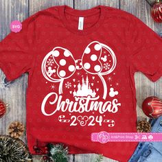 a red shirt that says christmas with minnie mouse ears