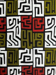 an abstract pattern with red, green and black squares