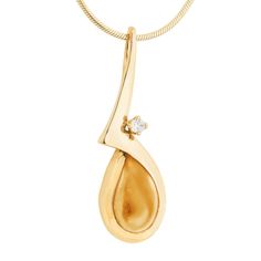 Andes Elk Ivory Gold Pendant 14k Gold Teardrop Pendant Jewelry With Polished Finish, Teardrop Pearl Pendant In Yellow Gold, Formal Yellow Gold Teardrop Pendant Jewelry, Yellow Gold Teardrop Pendant Jewelry With Large Pendant, 14k Yellow Gold Pear Necklace, Yellow Gold Teardrop Necklace With Pearl Pendant, 14k Yellow Gold Pear Shaped Necklace, Elegant Amber Jewelry With Large Pendant, Yellow Gold Teardrop Pendant Necklace With Polished Finish