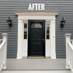 a black front door with white trim and the words after painted on it's side