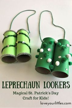 two green paper roll christmas trees with white balls on them and the words leprechaun lookings