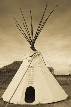 size: 12x8in Photographic Print: Native American Teepee, Grand Island, Nebraska, USA by Walter Bibikow : Fine Art Photographer Walter Bibikow has traveled the world to capture breathtaking images spanning the intricacies of the tiniest flower to the grandeur of vast architectural and scenic wonders. For three decades, Bibikow has trekked to regions including Africa, the Middle East, the Caribbean and North America, often returning to a location several times during different seasons, or in chang Grand Island Nebraska, Indian Teepee, Indian Photos, Native American Teepee, Tee Pee, Survival Gardening, American Architecture, Tattoo Sleeve, Beginner Painting