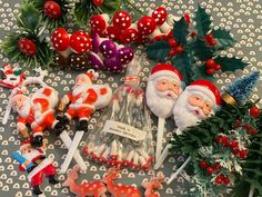 christmas decorations including santa claus, mushrooms and candy canes