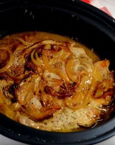 the food is being cooked in the crock pot on the stove top, ready to be eaten