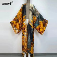 Kimono Kaftan Boho Soft Cardigan  Batwing Sleeve  Brand Name : winyi    Material : Rayon    Pattern Type : Print    Style : Young Style    Young Style : Bohemian    Age : 25-34    Fit : Fits larger than usual. Please check this store's sizing info Printed One-size Kimono For Fall, One Size Printed Kimono For Fall, Printed Long Kimono For Fall, One Size Patterned Long Sleeve Kimono, Floral Print Long Sleeve Cardigan, Fall Vacation Printed Cardigan, Beach Kimono Free Size For Fall, Free Size Fall Kimono With Kimono Sleeves, Free Size Long Sleeve Fall Kimono