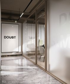 an empty room with two chairs and a sign on the wall that says doubt