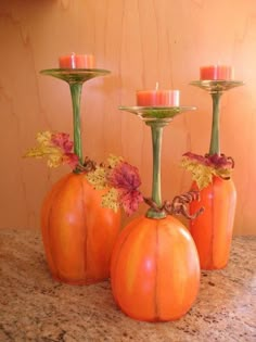 an image of three pumpkins with candles in them on top of a facebook page