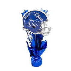 a football helmet bouquet with blue streamers