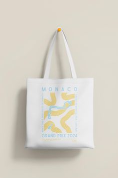 Our 2024 Grand Prix Tote Bags are sleek, aesthetic and stylish. Want to display your love for Formula One, but also want a statement bag to carry around? This Tote for the Monaco GP offers a piece of art that is both aesthetic and relates to your favourite sport! Showcase your favourite race, or your favourite drivers winning circuit with this beautiful bag!  **PLEASE BE AWARE - THIS IS BAG WILL BEEN CREATED AND SHIPPED THROUGH PRINTIFY .: 100% Cotton .: Extra light fabric (4.13 oz/yd² (140g/m . Formula One Gifts, Monaco Gp, Sleek Aesthetic, F1 Formula, Monaco Grand Prix, Statement Bag, Formula One, Beautiful Bags, Grand Prix