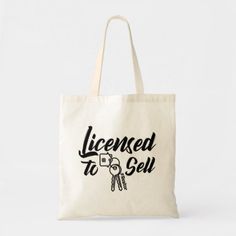 a tote bag with the words license to see on it