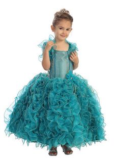 Let your little one shine like royalty in this breathtaking Bolero Vest Ruffled Pageant Dress by Tip Top Kids. Ideal for special events such as pageants, birthday parties, or formal gatherings, this dress combines elegance with a touch of whimsy. Features: Regal Design: The dress features a sleeveless bodice with a stylish square neckline, enhanced by playful ruffled straps that add a touch of charm. Lush Tulle Skirt: The voluminous skirt is crafted from layers of rich tulle, creating a dramatic and enchanting silhouette perfect for twirling. Sparkling Accents: The bodice is adorned with subtle glitter that catches the light beautifully, while a delicate flower detail at the waist adds a sweet finishing touch. Comfortable Wear: The dress is designed to ensure a comfortable fit with a struc Girls Dress Outfits, Toddler Flower Girl Dresses, Infant Flower Girl Dress, Regal Design, Tea Party Dress, Baby Christmas Outfit, Organza Dress, Pageant Gowns