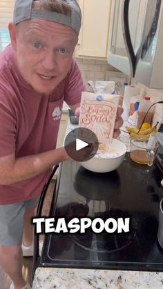 an old man is cooking in the kitchen with his headband over his face and holding a spoon