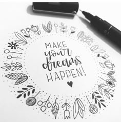 the words make your dreams happen written in a circle surrounded by doodles and markers